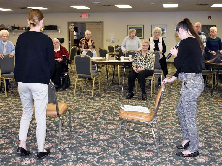 Students demonstrating exercises for balance